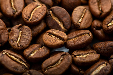 Coffee beans close-up background. Fresh roasted