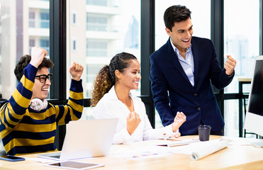 Successful young business design team having a meeting together.