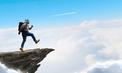 Hiker man in mountains. Mixed media