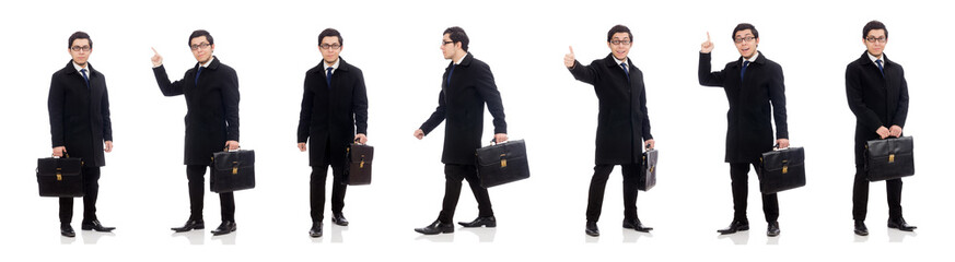 Young man holding suitcase isolated on white
