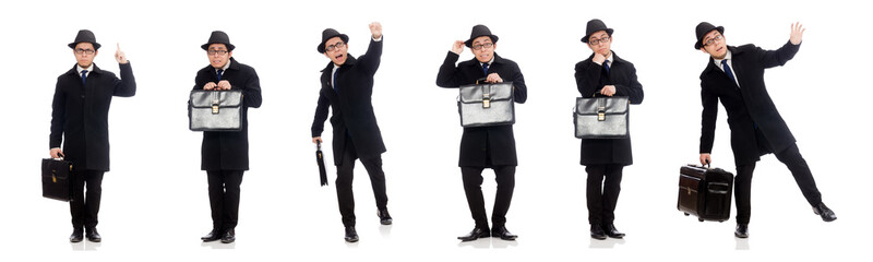 Young man holding suitcase isolated on white