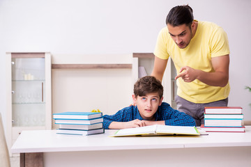 Father helping his son to prepare for school