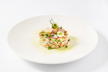 Russian Oliver Salad on the white background.