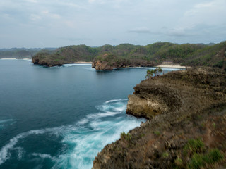 aerial view, bird view, from coral hit by the waves with slow speed photo techniques