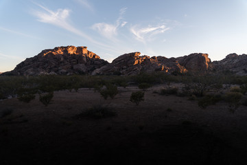 Rocks lit up during sunset at Hueco Tanks, Texas. 