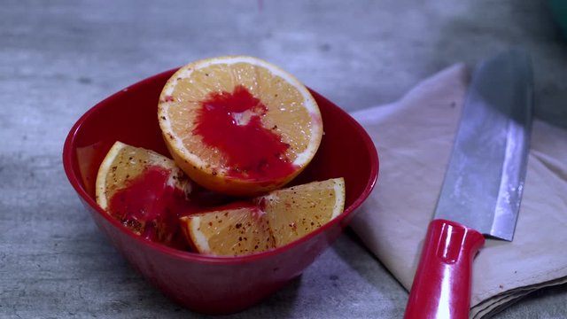Orange with chili snack cutting