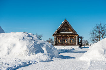 Typical old russian house covered with snow/ Winter Landscape/ Suzdal/ Russia/ Golden Ring of...