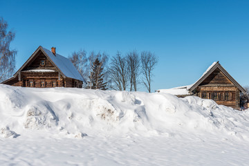 Typical old russian house covered with snow/ Winter Landscape/ Suzdal/ Russia/ Golden Ring of Russia Travel
