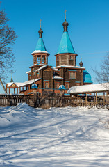 The Church of the Holy Women of the Myrrhbearers in the village of Krutovo, is located in the floodplain of the Klyazma River (2000-2003). An example of a tent temple. Russia. Winter landscape.