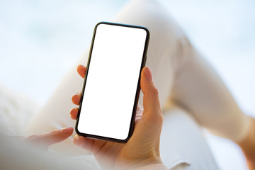 Woman using mobile phone at home. Smartphone screen mockup.