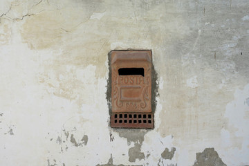 ceramic letterbox of mail box with the word posta (meaning mail or post) and floral decorations