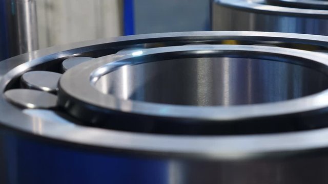 Industry concept. CNC engraving. Laser engraver with cnc, logo engraving laser. Laser engraving on metal. Bearing manufacture. close-up. 4k video