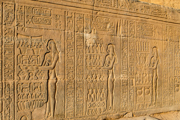 Ruins and Hieroglyphs in the famous Temple of Kom Ombo in Egypt on nile river bank