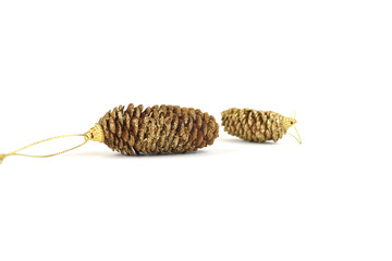 Fir cones with sparkles isolated on white background. Greeting card. New Year's holidays. Decoration