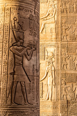 Ruins and Hieroglyphs in the famous Temple of Kom Ombo in Egypt on nile river bank