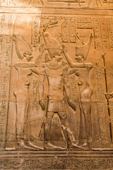 Ruins and Hieroglyphs in the famous Temple of Kom Ombo in Egypt on nile river bank