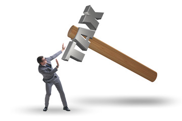 Businessman under the burden of tax payments