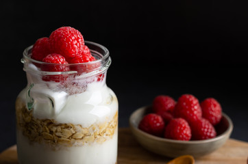 breakfast yoghurt with muesli and raspberry