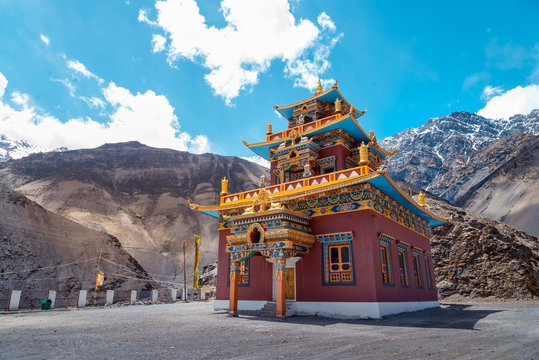 Gue Monastery under clouds and mountains