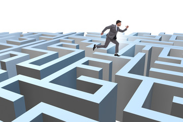 Businessman trying to escape from maze