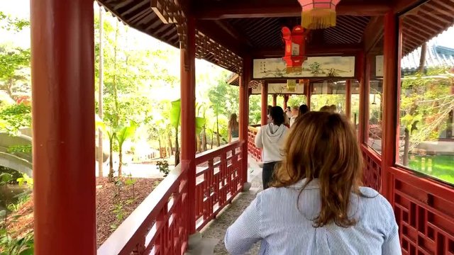 People on pathway at Pairi Daiza - Zoo - Park