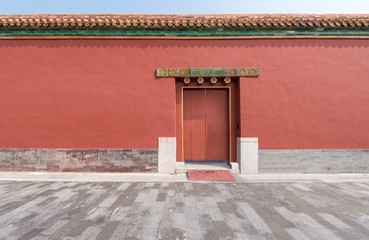 Red walls, green tiles and red doors in the Imperial Palace, Beijing