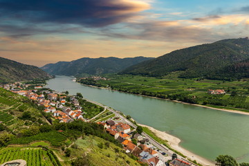 Fototapeta premium Wachau valley with the river Danube and town Spitz on a sunset. Lower Austria.