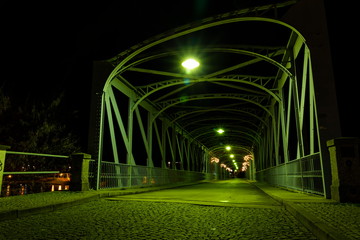 Old iron Bridge over Vltava river in Tyn nad Vltavou, Czech Republic.