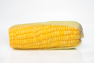 Fresh  sweet corn isolated in white background.