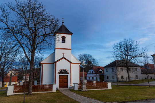 Little church in czech village Jankov. Autumnal evening.