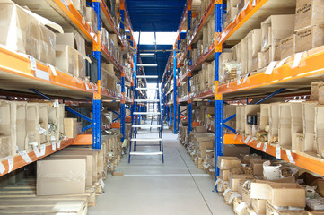 Industrial storage. Shelving with boxes - obrazy, fototapety, plakaty