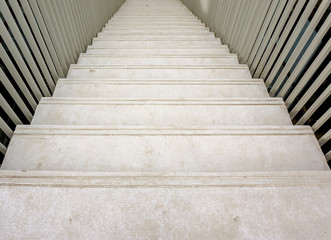 Image of way down the write cement stairs.