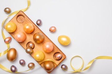 Pastel pearl Easter eggs on white background