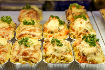 Closeup and crop Pizza cup in bakery shop.