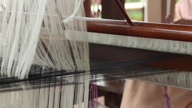 "Khit" in the Northeast Thai dialect means to tickle, pull or scoop up. Khit textiles.