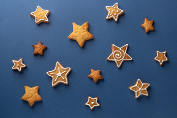 Ginger cookie stars on a blue background