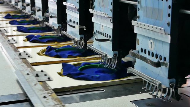 Embroidery machine embroidering logo on Piece of cloth Industry at Garment Manufacturers