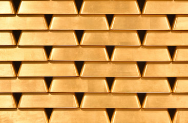 Gold bullion wall texture. Gold bullion background, pattern