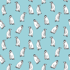 Fototapeta premium Penguins, hand drawn doodle, sketch, seamless pattern design on soft blue background