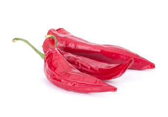 Dried red chili or chilli cayenne pepper isolated on white background cutout closeup