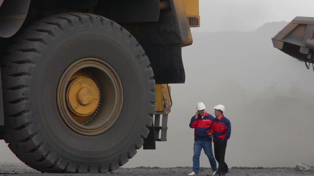 Mining dump trucks in the open pit mine, heavy truck in coal mine
