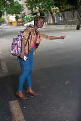 portrait of a young woman with backpack.