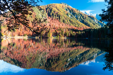 Colorful autumn foliage at the alpine lake