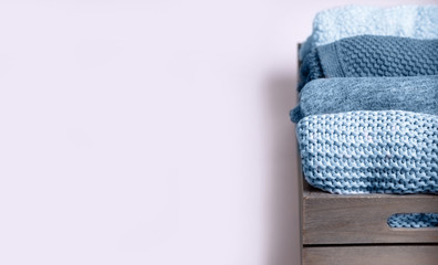 home comfort, textile, knitted, women's clothing, cotton, folded in a wooden box. concept of order,...