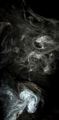 White smoke on black background
