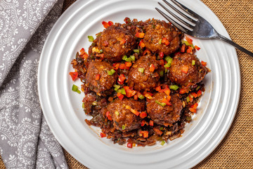 meatballs with served on a white plate