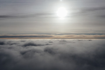 clouds at sunset from iljuminatora plane sky Sun travel