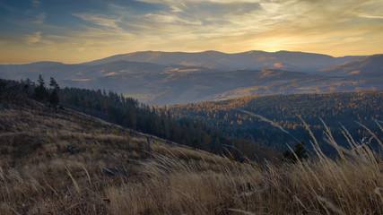 Dramatic autumn sunrise forest hills landscape, Kralova hola Slovakia