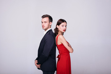 Portrait of white couple with an argument and standing back to back.