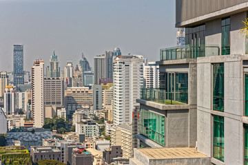 Bangkok, Thailand – December 22, 2019 : Office Buildings, city and condominiums Area in Bangkok, Office Building in City, Modern Building, Businesses Building. Sky view from Asoke area. with blue sky.